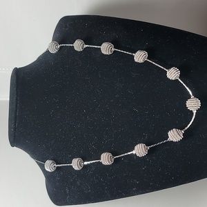 Monet necklace 18" silver tone chain with 11 round coils
